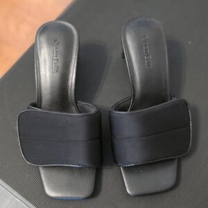 Elegant Black Mules by Open Edit